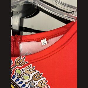Women's orange African print jumper size XL